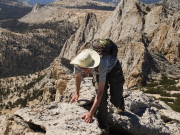 Bill scrambles up the arête.