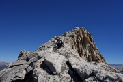 Scooting down the narrow arête