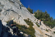 Bill photographs climbers starting up the southeast buttress.