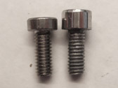 I replaced the stock high-profile bolts on the drive side of the Edge1500 motor with the low-profile bolts so that my rear derailleur cage could shift into the large sprocket without striking the bolt heads.  The low-profile heads take a 2.5mm Allen key, but the high-profile heads take a 4mm.