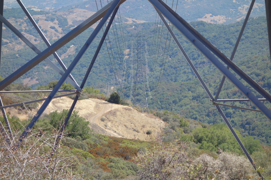 Power lines march down the mountain to the southeast.