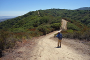 Frank starts down a steep section of Kennedy Trail called