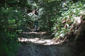 David on a muddy section of El Corte de Madera Creek Trail
