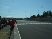 Bill passing the start/finish line in the eCat1 race.