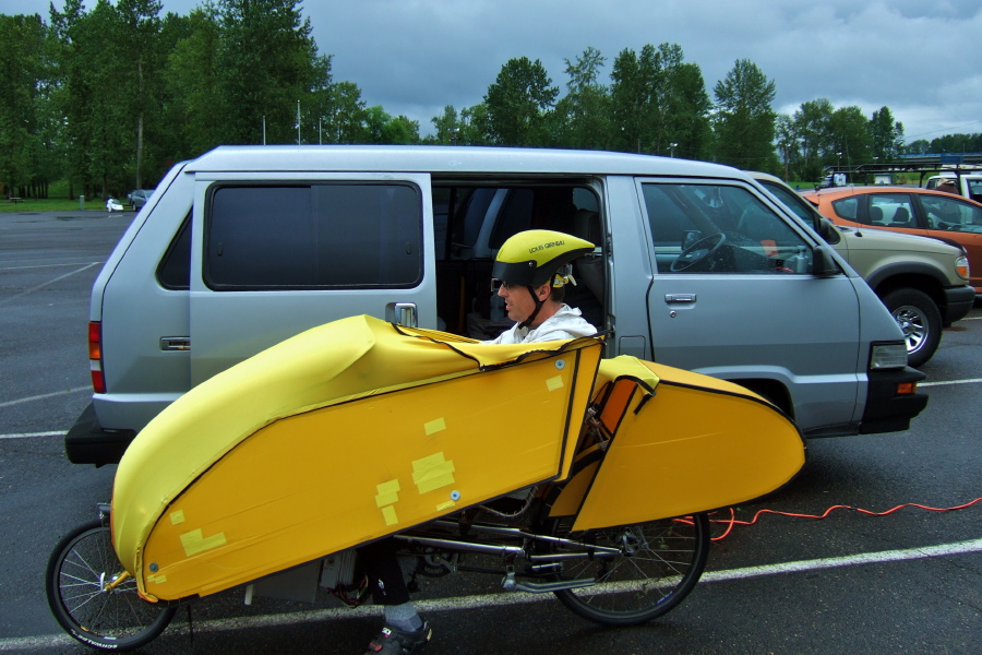 Bill checks out the bike before the eCat1 race.