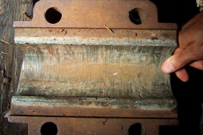 Bushing on which the saw shaft ran.
