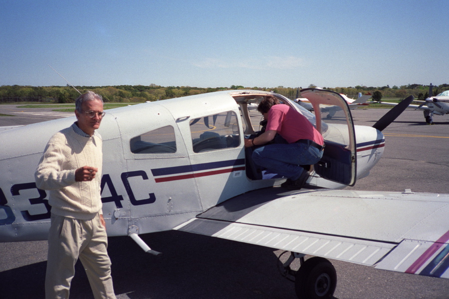 Getting into the plane.