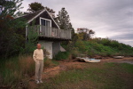 David in front of the boat house.