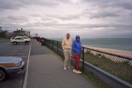 David and Pamela at the railing in front of the Coast Guard station.