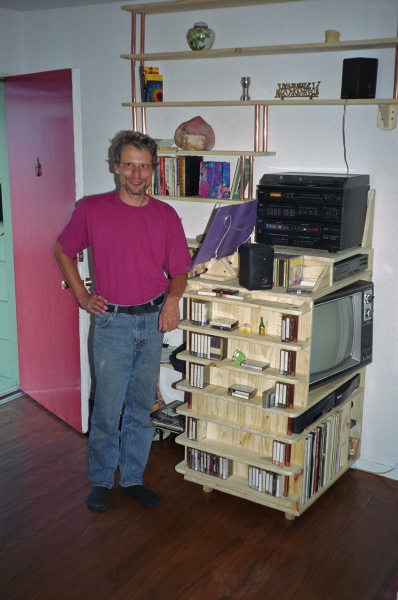 Frank models his multimedia cabinet.