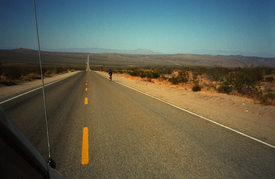 Jude rides on through the desert on Trona Rd.