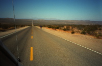 Jude rides on through the desert on Trona Rd.