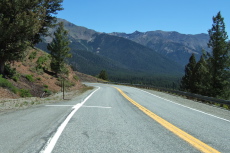 The view opens up as the road climbs out of the canyon.
