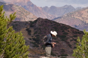 Bill finds his camera more interesting than the view.