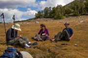 Bill fusses with his GPS device, Pauline prepares her luncheon, and Bogdan gets ready to go wading.