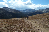 Ron Bobb and Stella reach the top of the ridge.