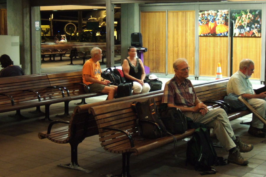 David relaxes on the comfortable bench in the waiting area.
