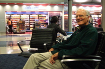 David is in surprisingly good spirits after the red-eye flight.