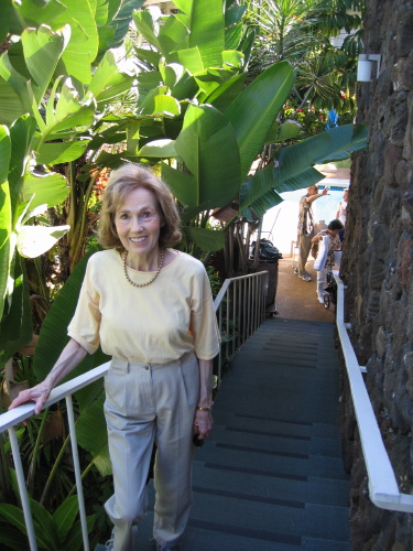 Kay on the stairs leading up to the rooms.