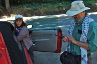 Frank sets up the Midland GMRS radios while Stella looks on.