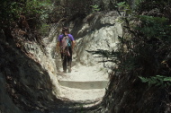 Stella climbs up the trench on the Ridge Trail.