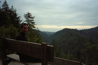 Bill sitting on the bench on Pipeline Rd.