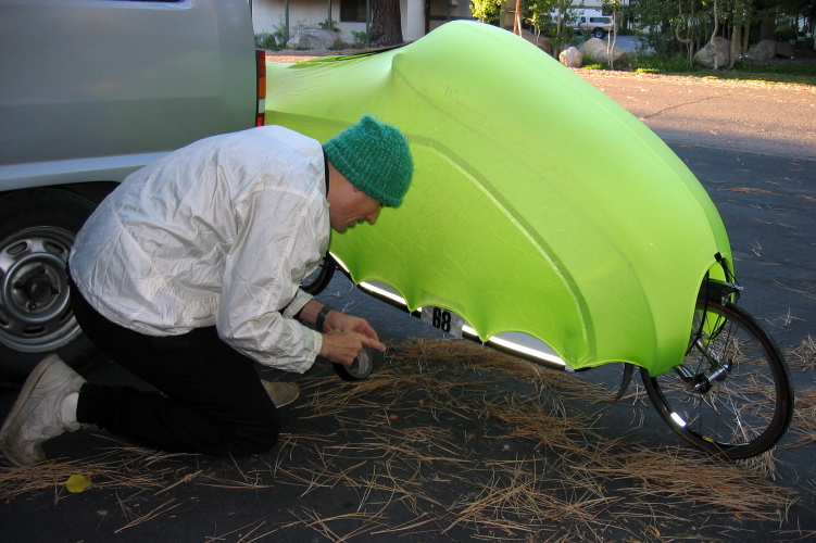 Bill tapes the number to the side panel.