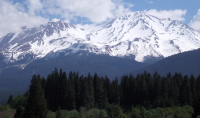 Mt. Shasta's clouds break up briefly.
