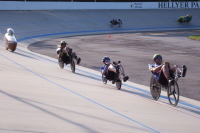 Peter Borenstadt, Tom Amick, Michael Cvetich, Fred Markam (right to left) approach the line.