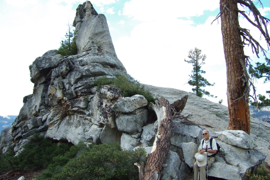 David rests below Indian Arch before we explore it more closely.