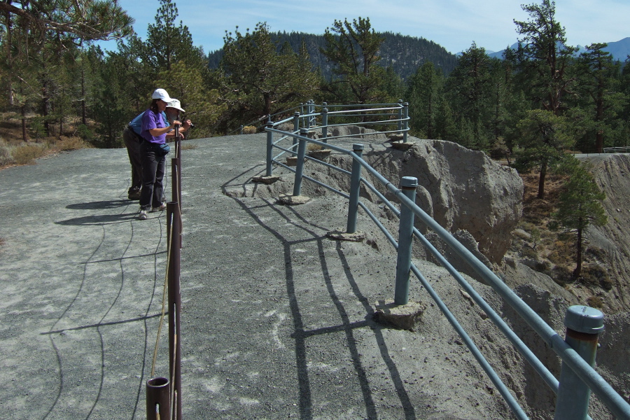 Frank and Stella stand at the rim of one of the craters.