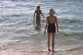 Laura and Kay enter the water.