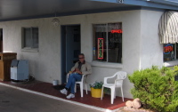 Quail Park Lodge office and owner's father.