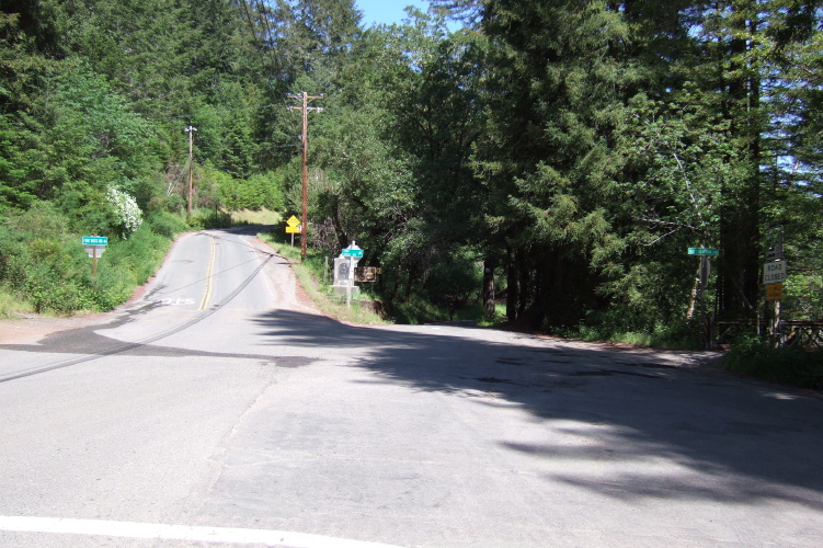 Fort Ross Rd. goes left; King Ridge Rd. goes right.
