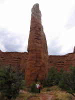 David and Kay in front of a chimney.