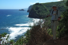 Bill takes a break at a spot affording a nice view along the cliffs of the north Kohala Coast.