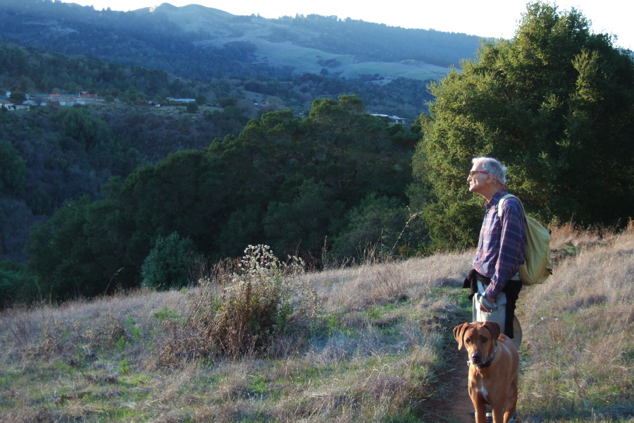 The sun sets behind Windy Hill.