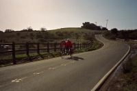 Josh and Carolyn riding past the Montebello preserve parking area.