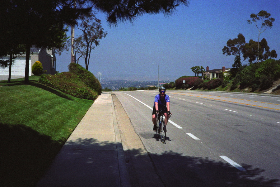 Chris reaches the top of Newport Coast Rd.