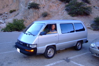 Alice and David relax at the van.