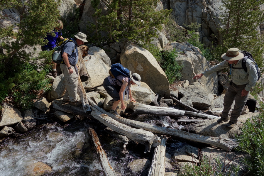 Trudy and Marc cross Lamarck Creek.