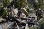 Trudy and Marc cross Lamarck Creek.