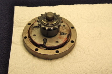 Washer and spacer positioned on output sprocket