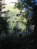 David hiking back up Last Chance trail under the frowning face of the Old Man.