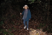 Kay starts down the shortcut past the sewage plant.