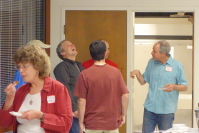 Tim Woudenberg (guffawing), ? (back to camera), Graham Pollock, and Jim Kern