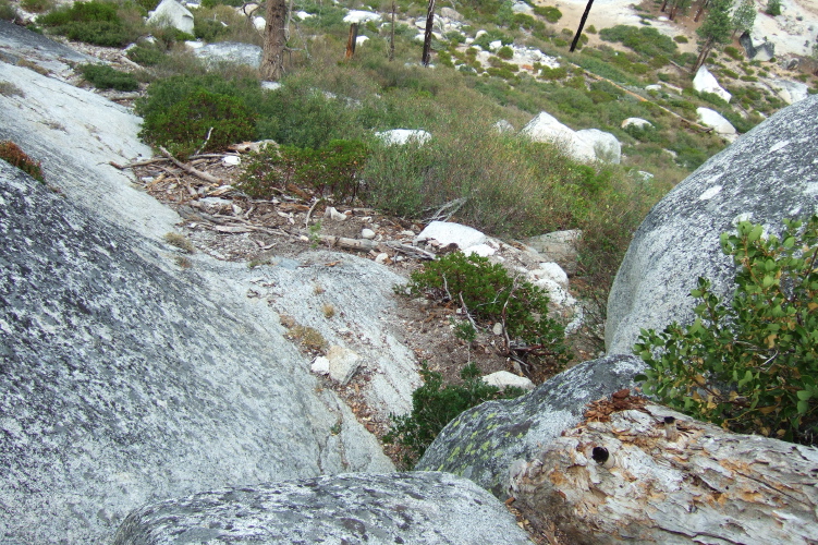 Looking down the class 3 maneuver at the crux of the route.