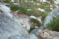 Looking down the class 3 maneuver at the crux of the route.
