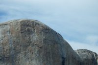 Hikers are just visible at the summit and on the final approach to Half Dome.