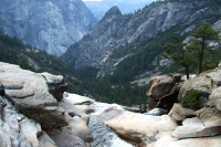 Water flowing over the brink of Nevada Fall, from the bridge.